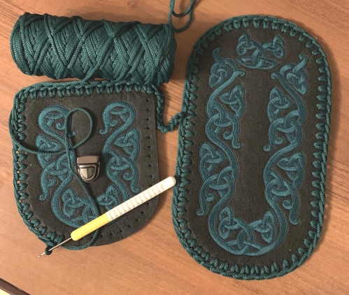 Crochet in the holes along all edges of both panels.