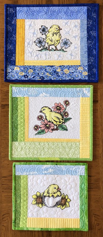 Finished quilts with chicken embroidery