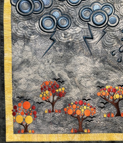Close-up of the quilting and embroidery.