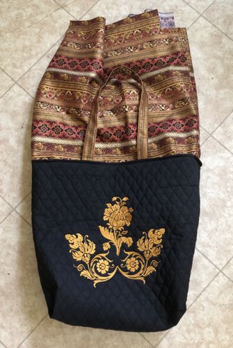 The lining attached to the outer bag along the upper edge.