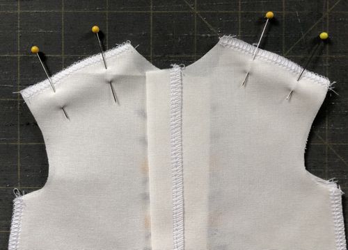 Pin the shoulder seams together.