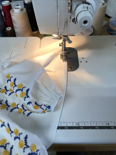 Topstitch the hem.