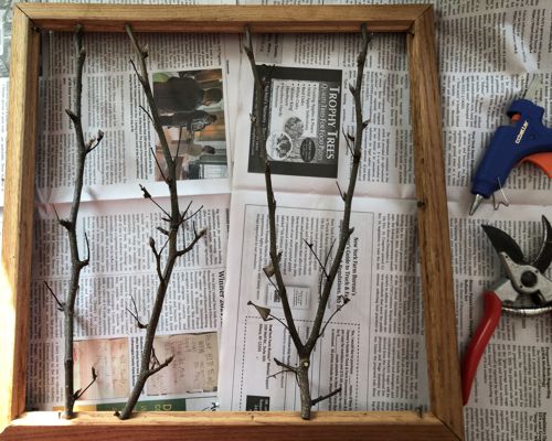 Twigs cut to the size of the frame.