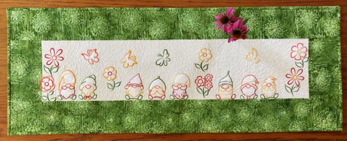 Finished quilted tablerunner with gnomes embroidery