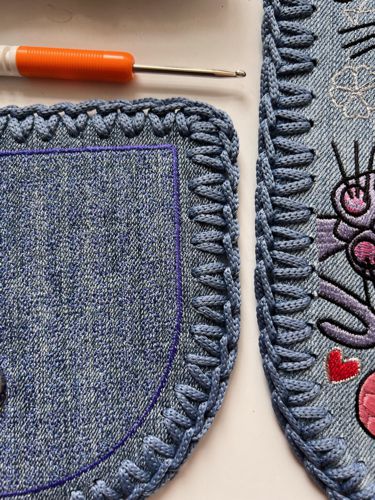 Crochet in the holes along all edges of both panels.