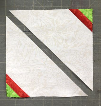 Cut the cream square along the diagonal