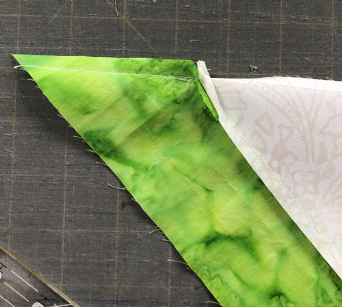 Cut the excess fabric with seam allowance 3/8"- 1/2".