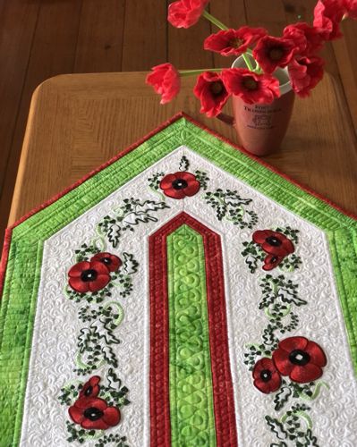 Close-up of the embroidery and quilting patterns.