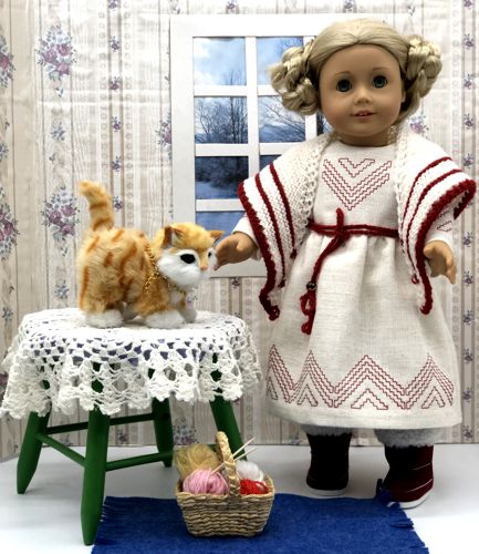 Finished dress on a doll.