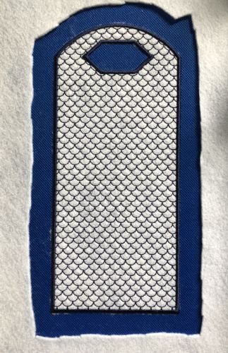 The stitch-out of the back panel.