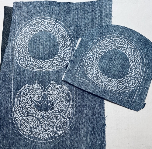 Stitch-outs of the designs on denim fabric