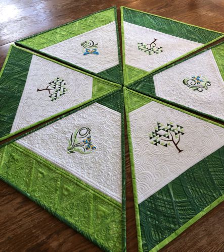 Finished quilted placemats with trees and butterflies embroidery