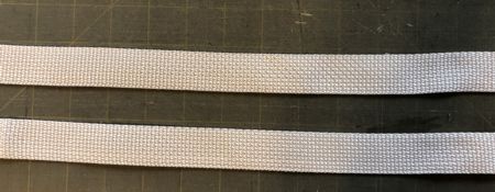 Handles cut out of webbing