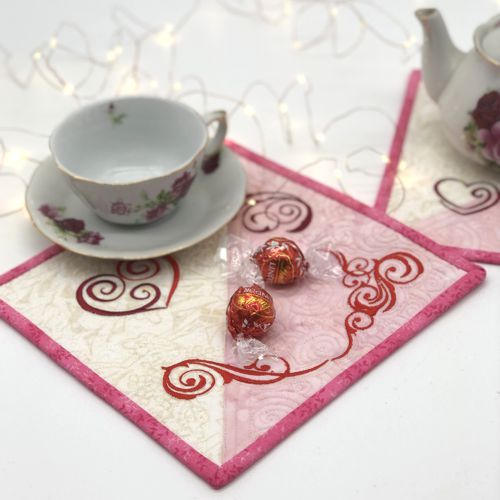 A mug rug with a tea cup.