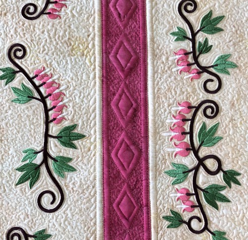 A close-up of the embroidery and quilting stitches.