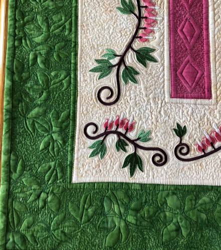 A close-up of the embroidery and quilting stitches.