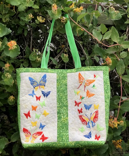 Finished tote bag with embroidery of butterlies. Front panel.