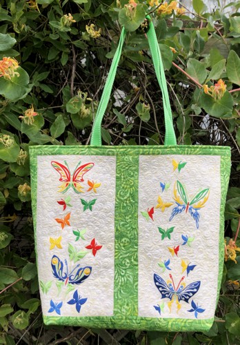 Finished tote bag with embroidery of butterlies. Back panel.