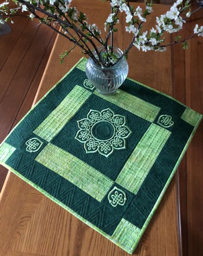 Quilted Table Topper in green colors with Celtic Embroidery