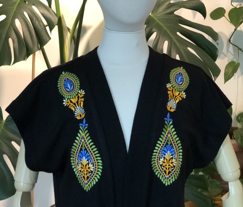 Jacket embellished with embroidery. Close-up