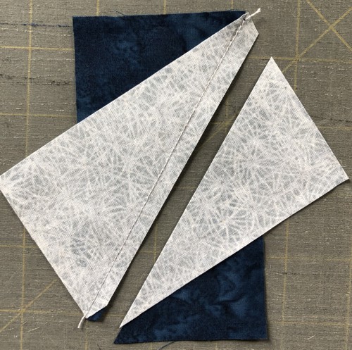 Stitch along the diagonal. Cut with seam allowance 1/4".