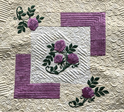 A close-up of the embroidery and quilting stitches.