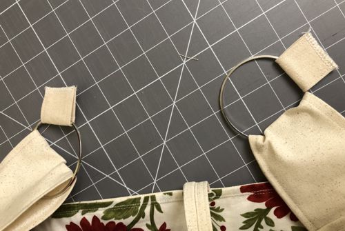 Fold the small 2" x 3" strips through the rings, align and stitch together the short ends.