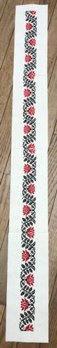 4 stitch-outs sewn together into a long strip.