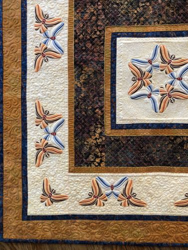 A close-up of the embroidery and quilting stitches.