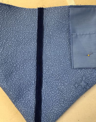 Sew the sidesPress the side seam open and topstitch on both sides.