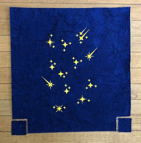 A 2" x 2" square cut at the bottom corners of the back panel.