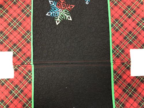 Bottom stitch topstitch 1/4" on both sides of the seam.