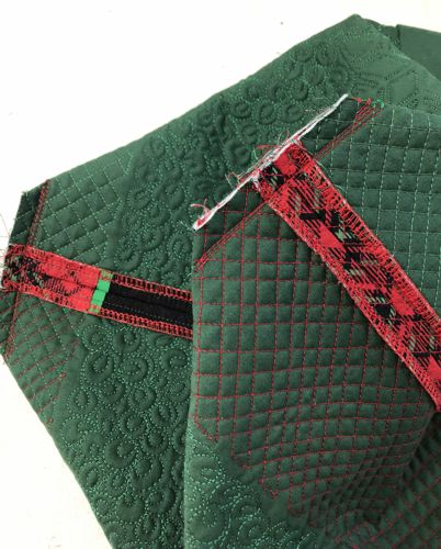 Stitch the bottom with several parallel lines.