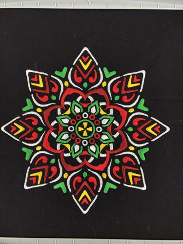 Embroidery of a large snowflake for the front panel.