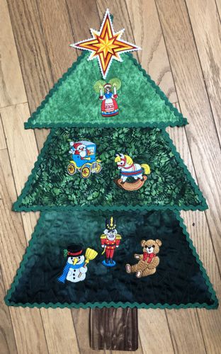 The assembled Christmas tree wallhanging.