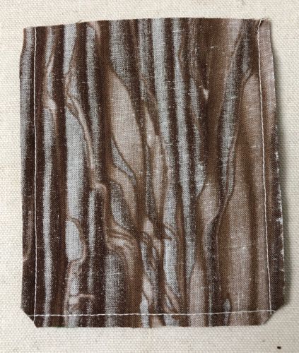 Stitch 3 sides of the piece and trim the corners.