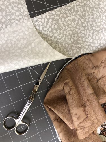 Cut away the excess fabric of the stitch-out.