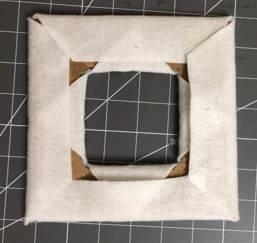 Fold the margins and secure with scotch tape.