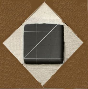 Fold the felt over the cardboard and secure with scotch tape.