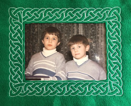 Green felt frame with Celtic embroidery.
