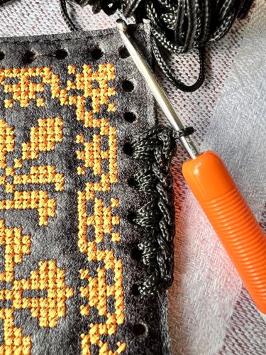 Using the 2mm cord and 3mm crochet hook make 2 rows of single crochet around each square