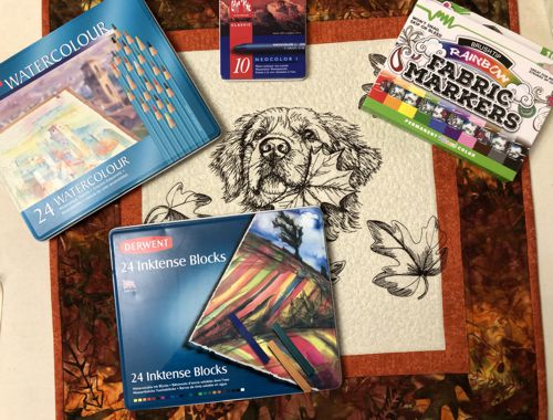 Paints, pencils and markers for the coloring fabrics.