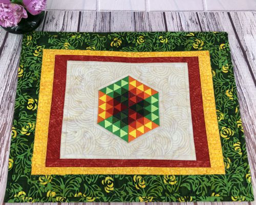 A close-up of the embroidery and quilting stitches.