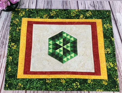 A close-up of the embroidery and quilting stitches.