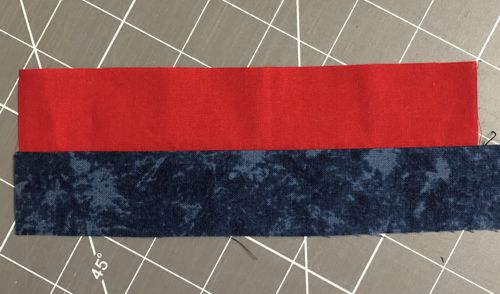 Red and blue strips stitched together.