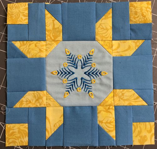 Finished block with the embroidered center.