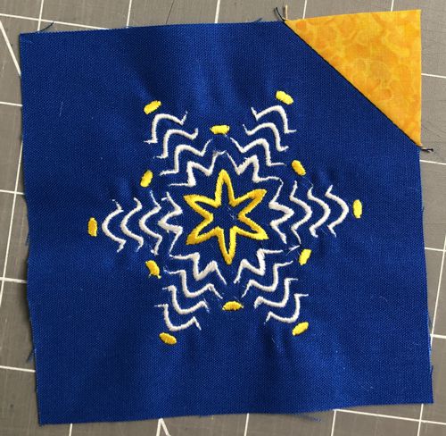 Unfold the square and press.