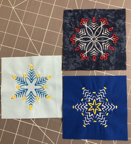 Stitch-outs trimmed to 4 1/2" squares.