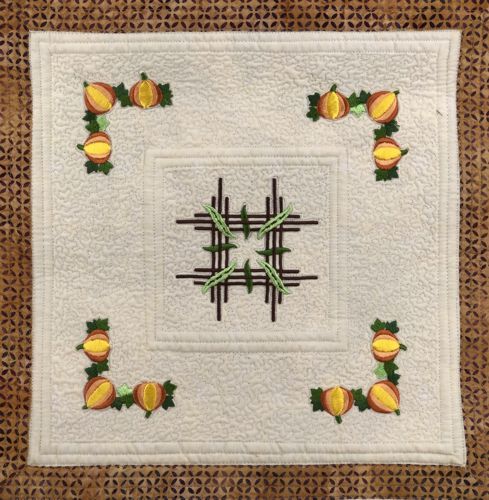 A close-up of the embroidery and quilting stitches.