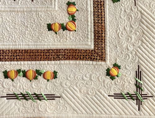 A close-up of the embroidery and quilting stitches.